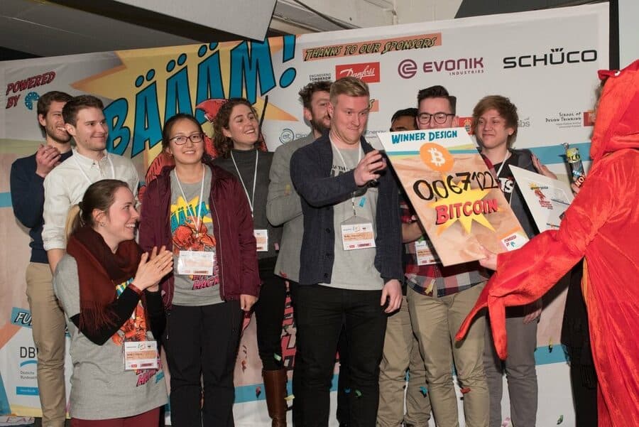 Perttu and his team celebrating their win on stage at EEHack in Berlin