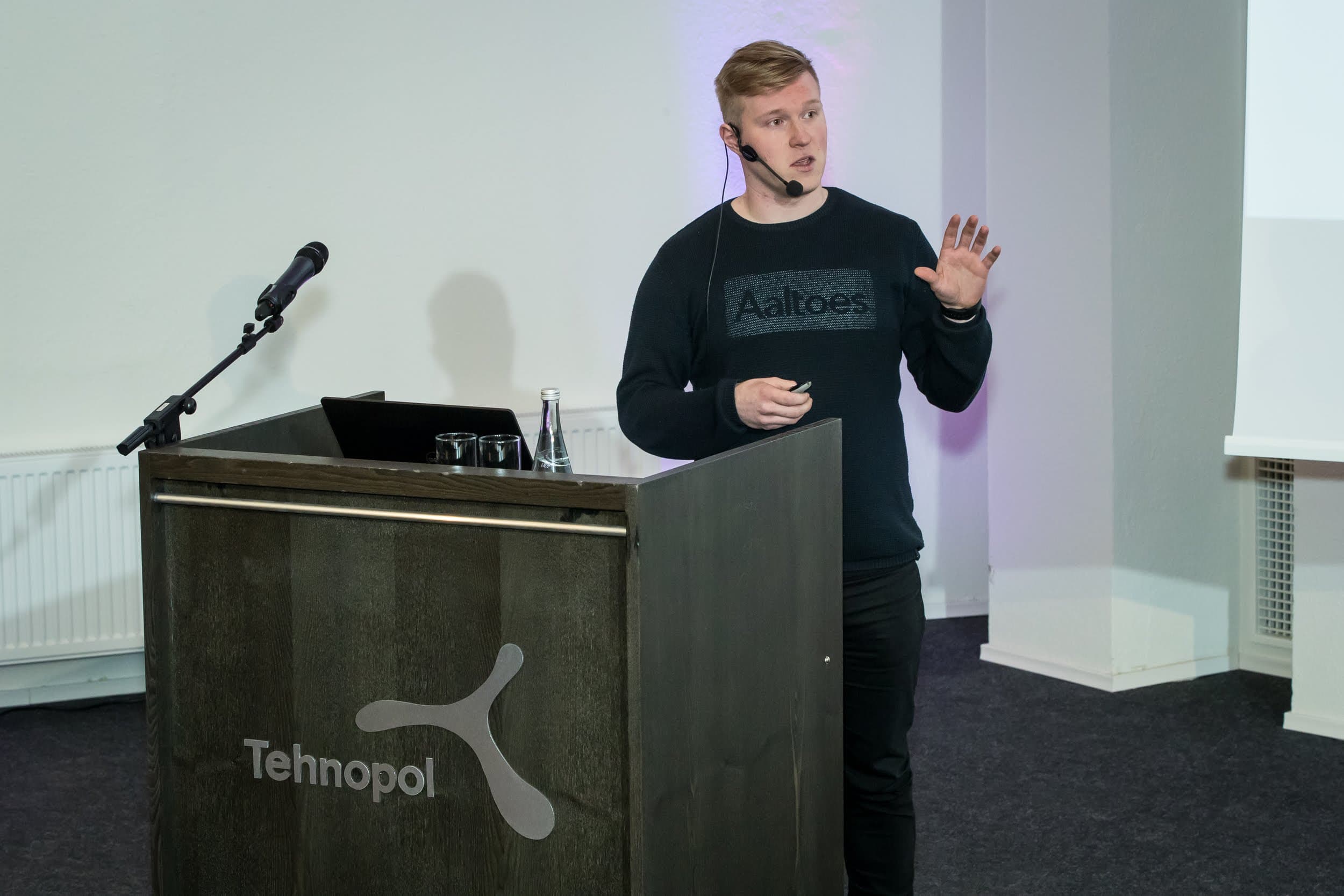 Perttu speaking at a conference